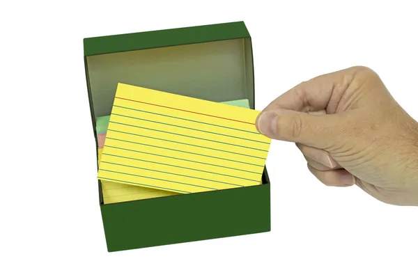 Hand Pulling Out Index Card — Zdjęcie stockowe