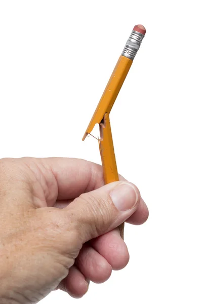 Mão segurando lápis quebrado de estresse — Fotografia de Stock