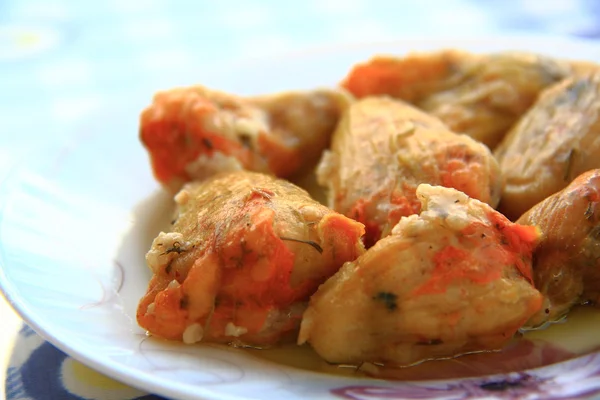 Rice in zucchini blossoms with olive oil Stock Photo