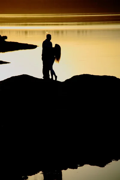 Romantic couple at sunset — Stock Photo, Image