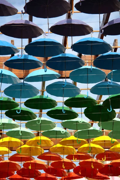 Umbrellas in different colours — Stock Photo, Image