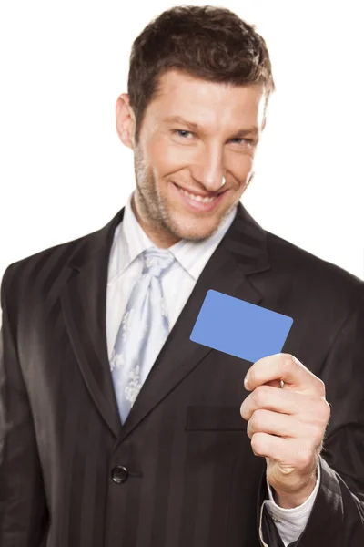 Homme d'affaires et carte de crédit — Photo