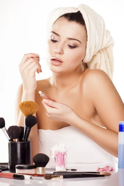 Towel and lip gloss — Stock Photo, Image