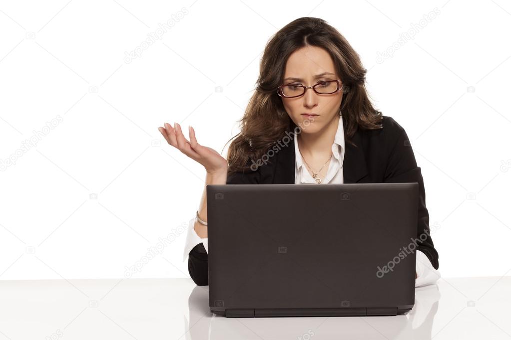 confused girl with a laptop
