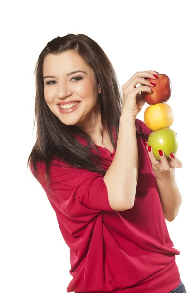 Fille, et trois pommes différentes — Photo