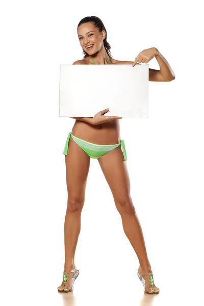 Advertising girl in bikini — Stock Photo, Image