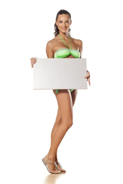 Advertising girl in bikini — Stock Photo, Image