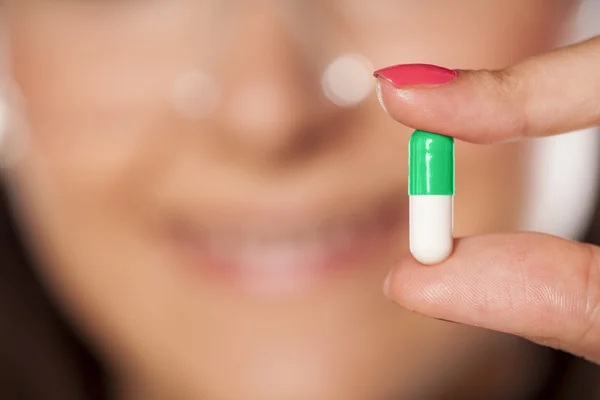 Scientist and capsule pill — Stock Photo, Image