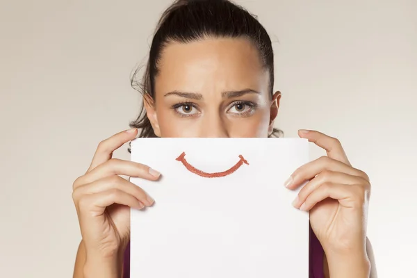 Sonrisa sobre papel — Foto de Stock