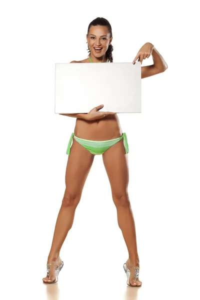 Advertising girl in bikini — Stock Photo, Image