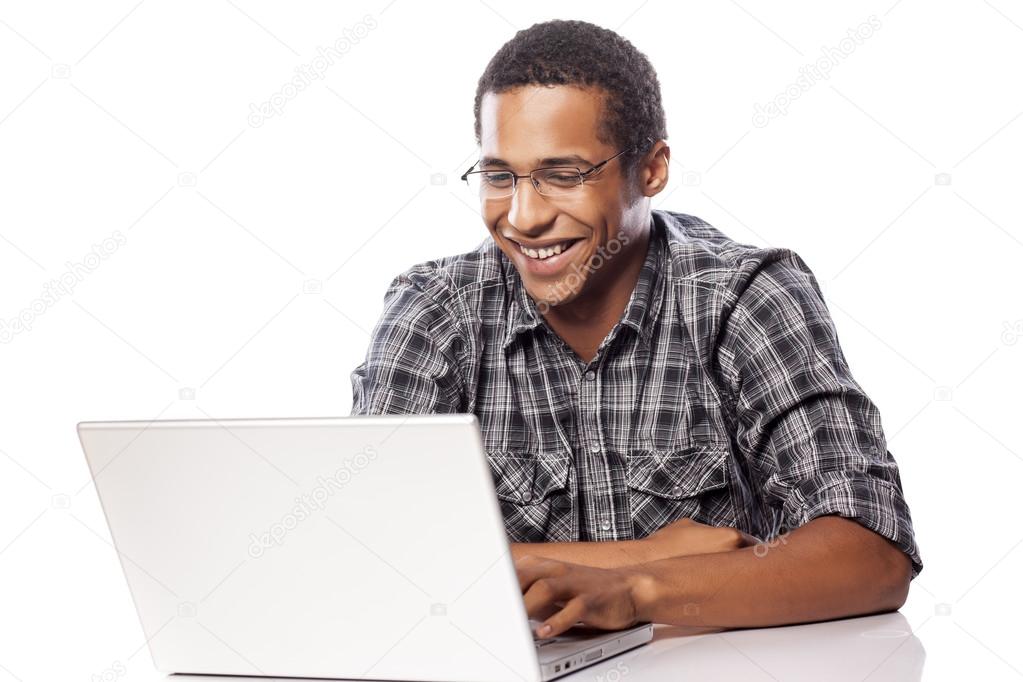 Positive man on computer
