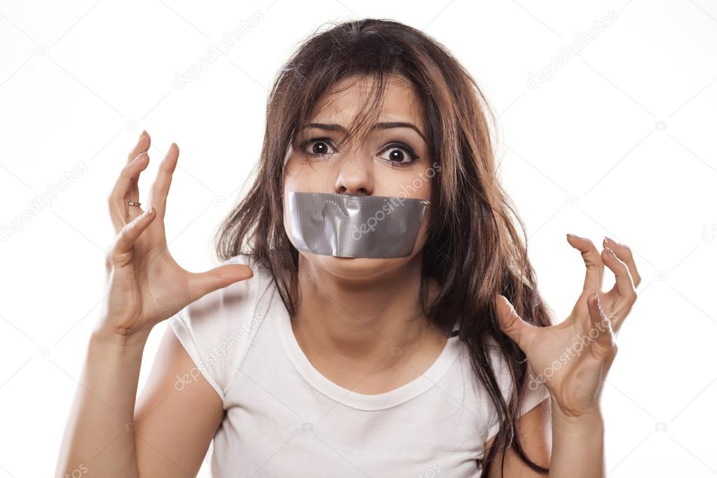 Self-adhesive tape over mouth