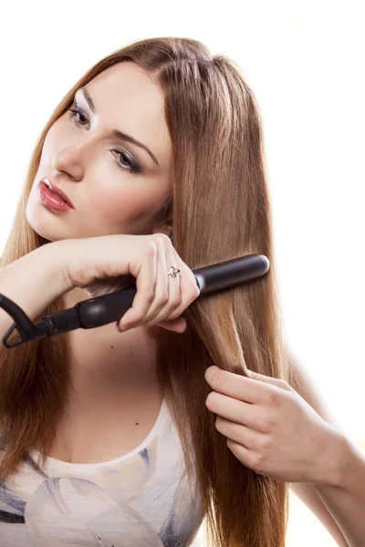 Hair ironing — Stock Photo, Image