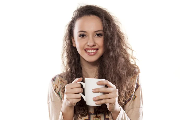 Girl holding a mug — Stock Photo, Image