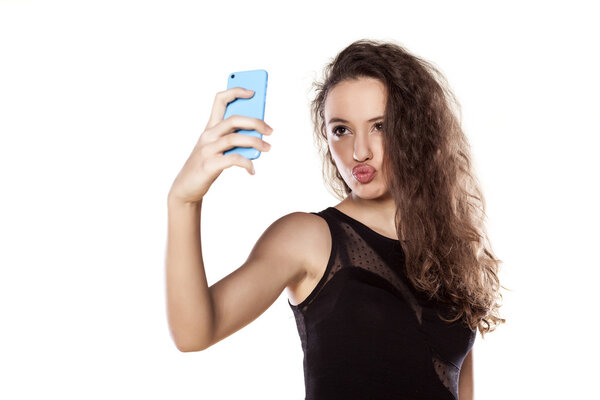 Teen taking selfie
