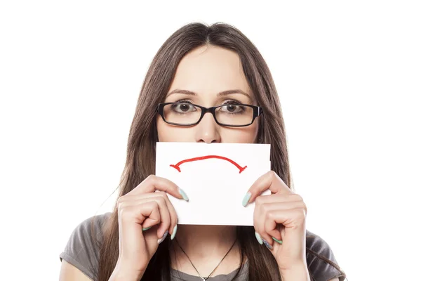 Sonrisa triste en un papel —  Fotos de Stock