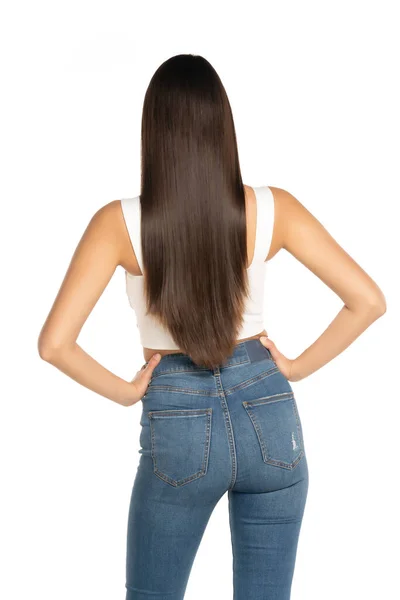 Visão Traseira Uma Jovem Mulher Bonita Com Cabelos Longos Jeans — Fotografia de Stock