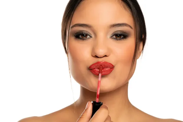 Portrait Young Beautiful Woman Applies Lip Gloss White Background — Stock Photo, Image