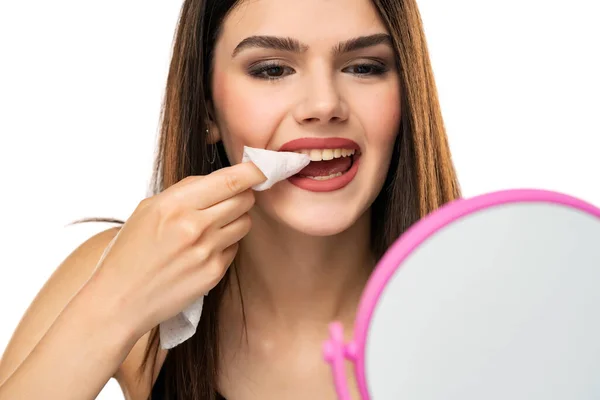 Young Girl Cleans Lipstick Her Teeth Tissue White Background — Stock Photo, Image