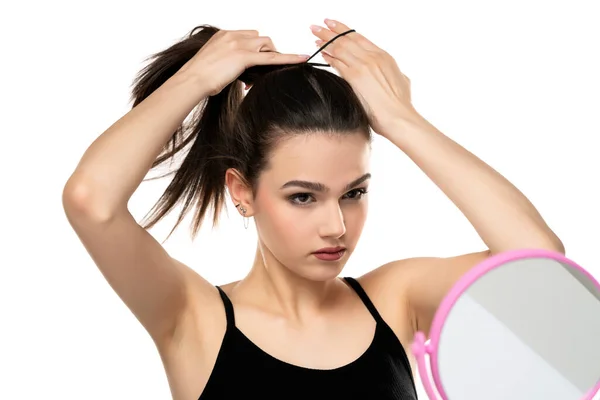 Frontr View Young Woman Tying Her Long Hair White Background — Stock Photo, Image