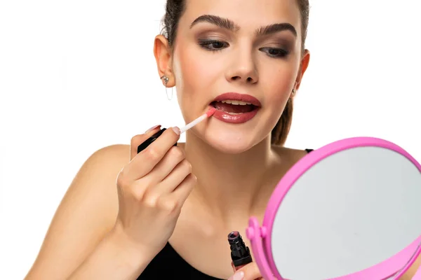 Beautiful Teen Girl Applyes Lip Gloss White Background — Stock Photo, Image