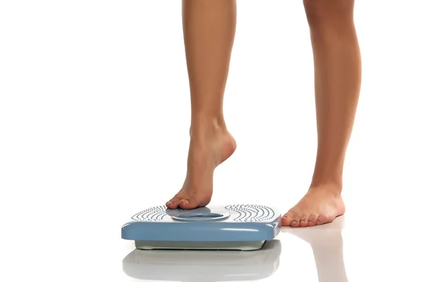 Female Legs Steps Scales White Background — Stock Photo, Image