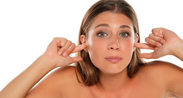 Young Beautiful Woman Blue Eyes Closes Her Ears Her Fingers — Stock Photo, Image