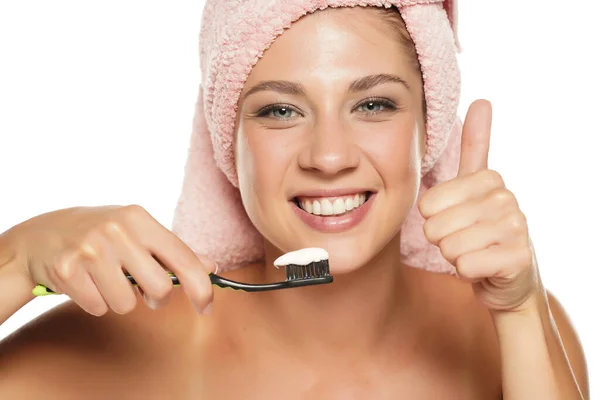 Happy Young Woman Holding Toothbrushwith Toothpaste White Background Showing Thumbs — Stock Photo, Image