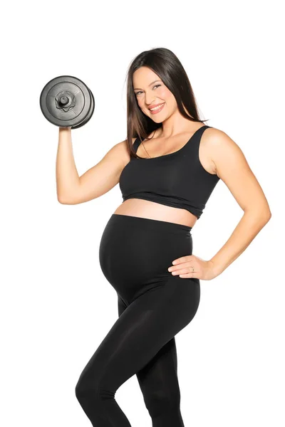 Gravid Ung Kvinna Svart Leggings Och Hirt Poserar Med Vikter — Stockfoto