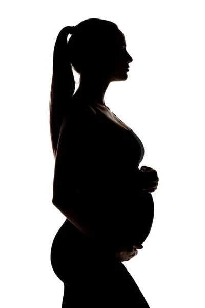 Beyaz Arka Planda Hamile Bir Kadının Silüeti — Stok fotoğraf