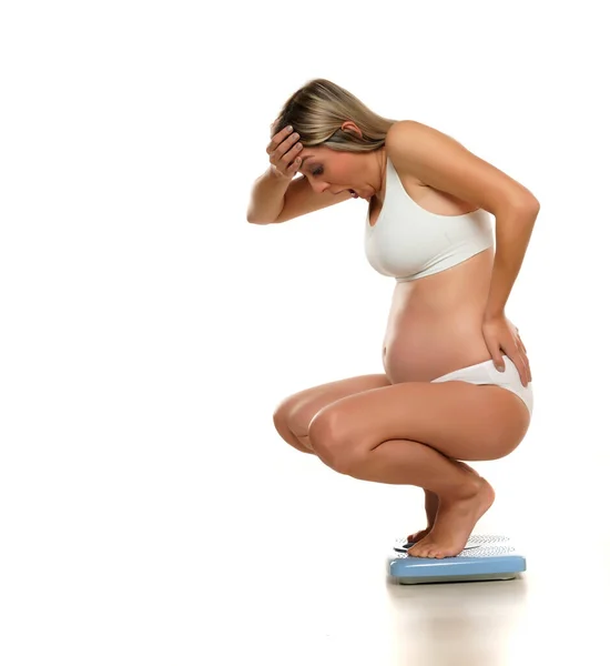 Young Shocked Pregnant Woman Crouching Position Scale White Background — Stock Photo, Image