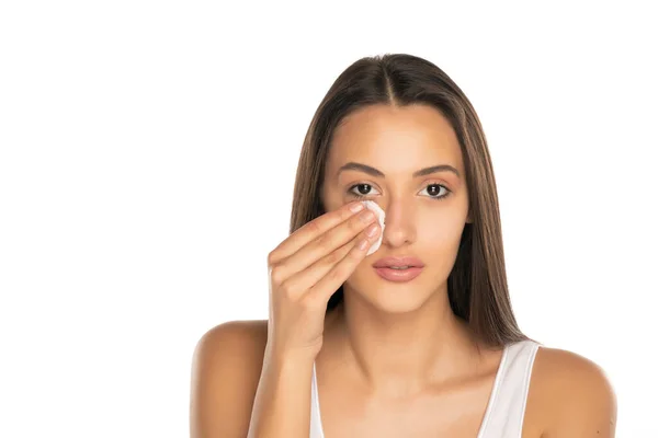 Young Woman Cleans Her Face Cotton Pad White Background — Stock Photo, Image