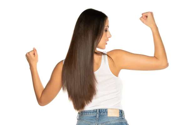 Задний Вид Молодой Женщины Длинными Волосами Показывает Бицепсы Руки Белом — стоковое фото