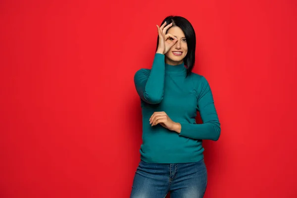 Young Beautiful Multicultural Woman Looking Trough Fingers While Smiling Happy — Foto Stock