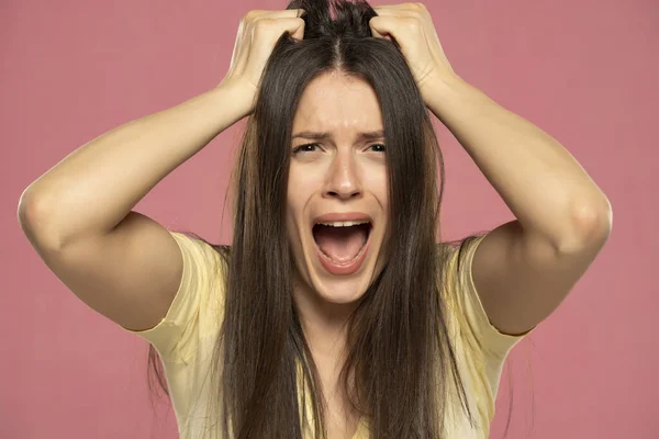 Closeup Portrait Stressed Frustrated Woman Screaming Isolated Pink Background Negative — Stock Photo, Image