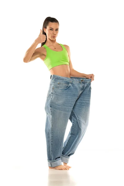 Diet Concept Weight Loss Happy Woman Oversize Jeans White Background — Stock Photo, Image