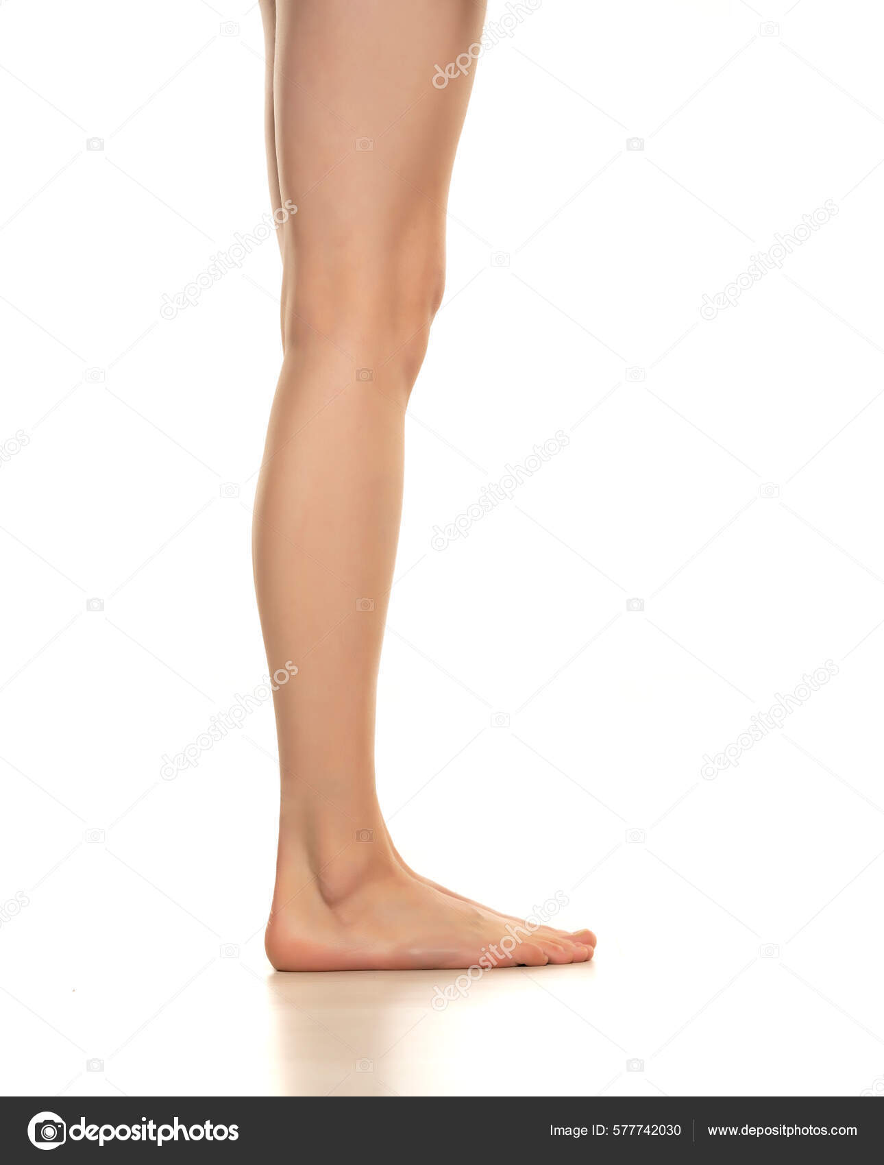 Side View Beautifully Cared Women's Legs Feet White Background
