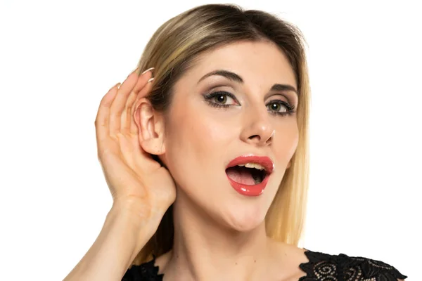 Young Blond Woman Straining Hand Her Ear While Listening White — Stock Photo, Image