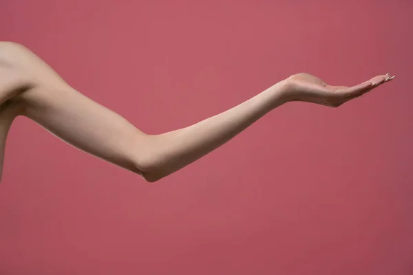 Young Woman Stretched Skinny Arm Open Palm Holding Imaginary Product — Fotografia de Stock