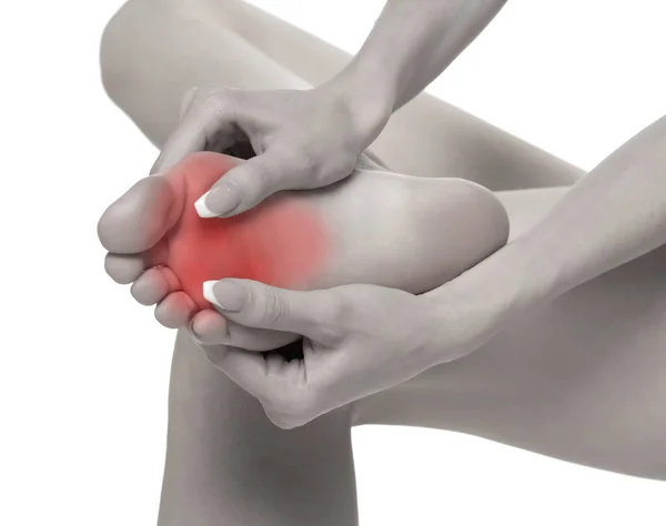 Woman Massaging Her Painful Foot White Studio Background — Foto de Stock