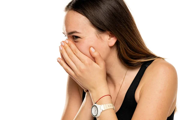 Woman Laughing Covers Her Mouth Her Hands White Background — Stockfoto