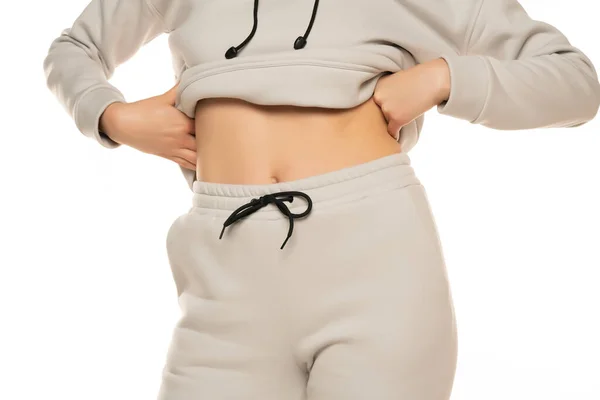 Cropped Photo Lady Sportswear Showing Her Belly White Background — Φωτογραφία Αρχείου