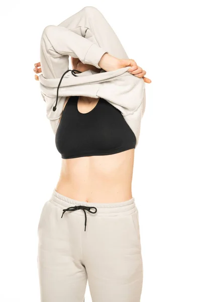 Front View Young Woman Takong Her Gray Tracksuit Hood White — Stock Photo, Image