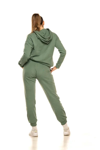 Rear View Young Woman Green Tracksuit Posing White Background Studio — стоковое фото