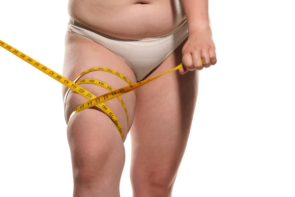 Overweight Woman Tape Measuring Fat Legs — Stockfoto