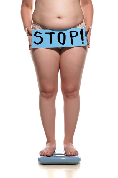 Obese Woman Standing Scale Holding Stop Board Her Belly — Stockfoto