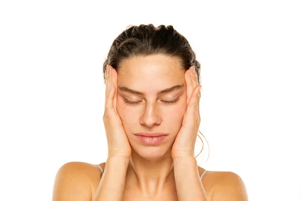 Young Woman Tightening Her Face Skin Her Palms White Background — Stock Photo, Image
