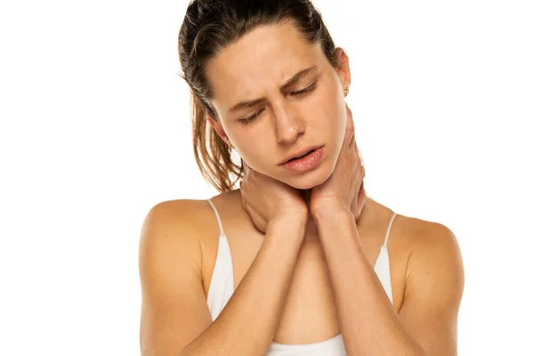 Young Woman Neck Pain White Background — Zdjęcie stockowe