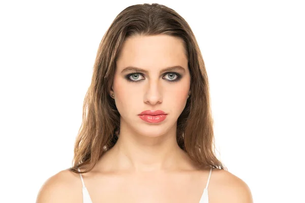 Beautiful Serious Woman Make Wavy Hair White Studio Background — Stockfoto