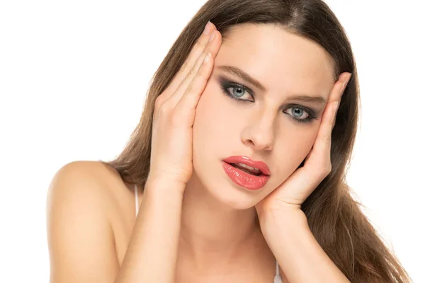 Young Woman Tightening Her Face Skin Her Palms White Studio — Fotografia de Stock